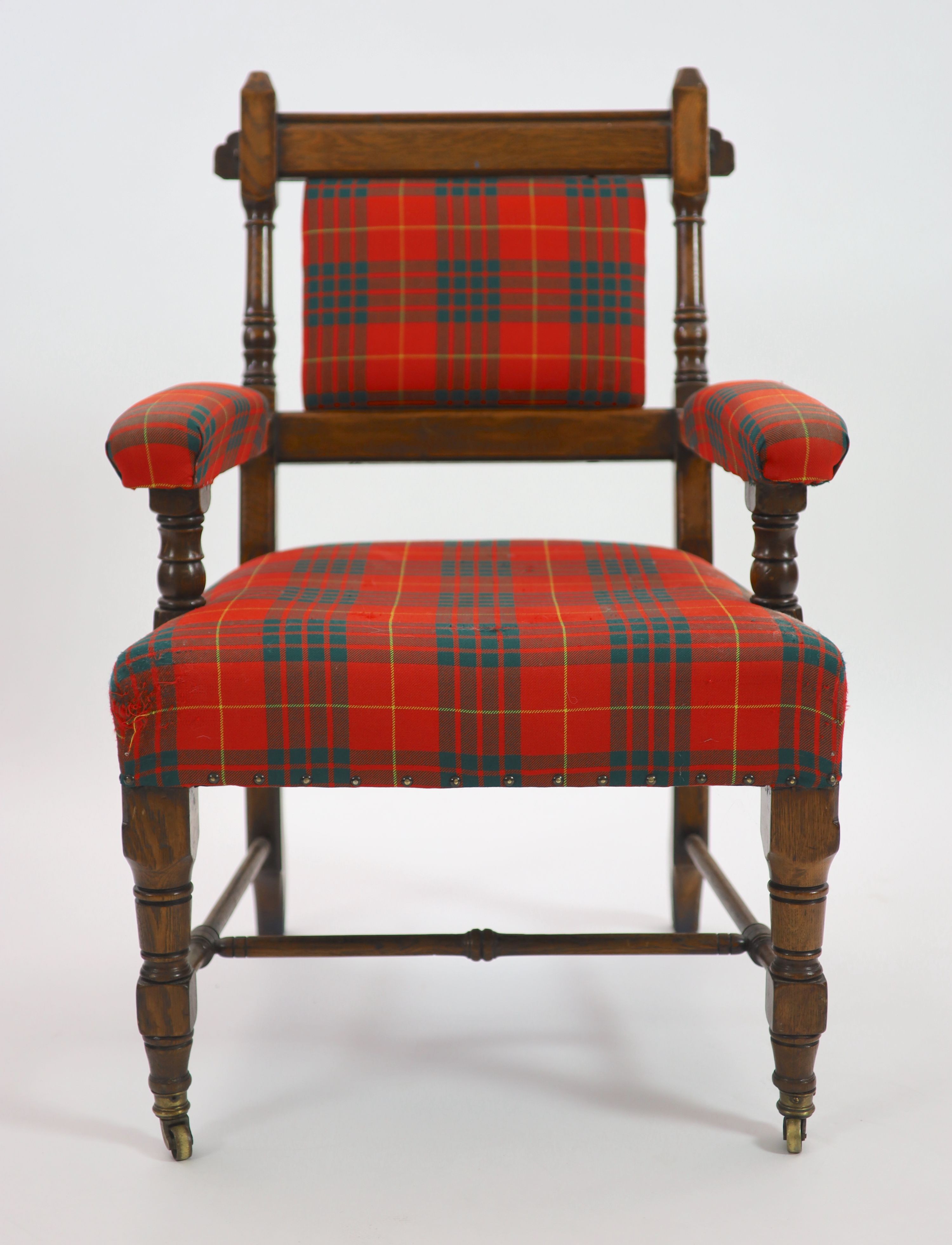 Royal Furniture - a Victorian Aesthetic movement oak open armchair W.66cm D.66cm H.100cm